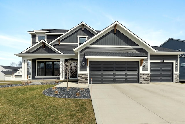 1757 Julienne Ct, Byron Center, MI 49315 - craftsman inspired home featuring a garage, a front yard, concrete driveway, board and batten siding, and stone siding
