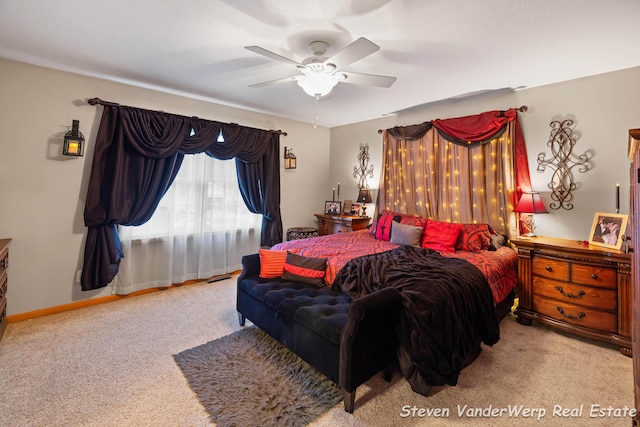 2567 Chippewa Trl, Muskegon, MI 49445 - bedroom with carpet floors, a ceiling fan, and baseboards