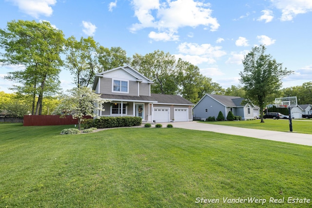 2567 Chippewa Trl, Muskegon, MI 49445 - traditional-style house featuring concrete driveway, an attached garage, and covered porch
