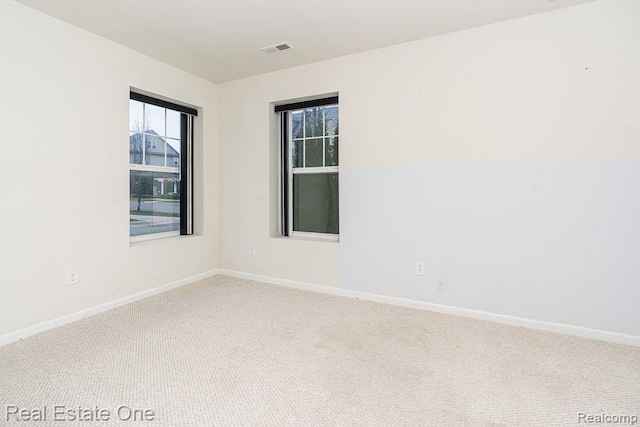 2669 Helmsdale Cir, Rochester, MI 48307 - carpeted empty room with baseboards