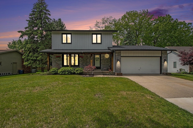 3025 Juneberry Ave SE, Grand Rapids, MI 49508 - traditional home with a garage, driveway, a front lawn, a porch, and brick siding