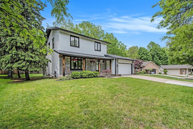 3025 Juneberry Ave SE, Grand Rapids, MI 49508 - view of front facade featuring a garage, driveway, covered porch, and stone siding