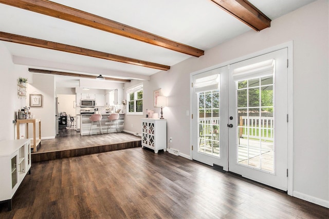 3025 Juneberry Ave SE, Grand Rapids, MI 49508 - living area featuring beamed ceiling, french doors, dark wood-style flooring, and baseboards