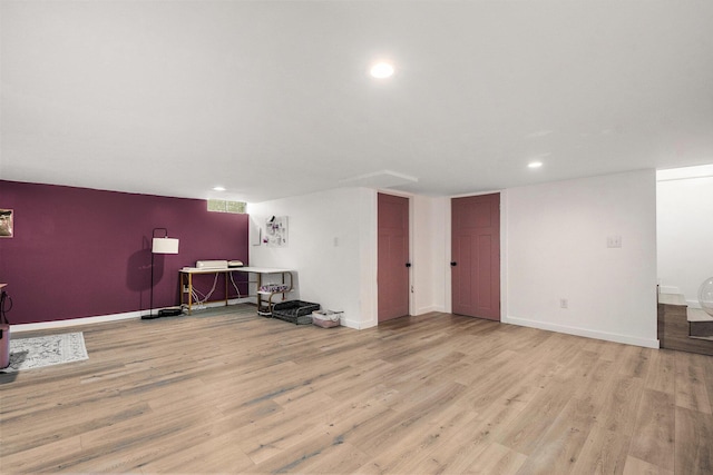 3025 Juneberry Ave SE, Grand Rapids, MI 49508 - living room featuring wood finished floors, recessed lighting, and baseboards