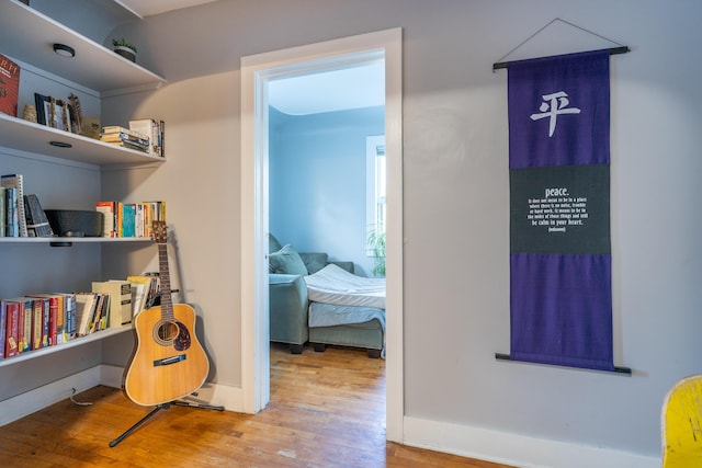 733 Lafayette Ave NE, Grand Rapids, MI 49503 - hall with wood finished floors and baseboards