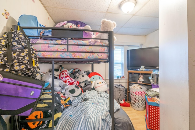 733 Lafayette Ave NE, Grand Rapids, MI 49503 - bedroom with a drop ceiling and wood finished floors