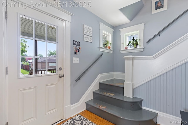 1 Jones St, Yale, MI 48097 - entryway with stairway, wood finished floors, and baseboards