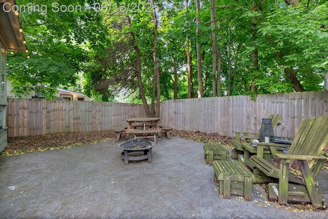 1 Jones St, Yale, MI 48097 - fenced backyard featuring a fire pit and a patio