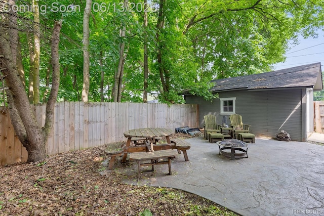 1 Jones St, Yale, MI 48097 - fenced backyard featuring a patio and an outdoor fire pit