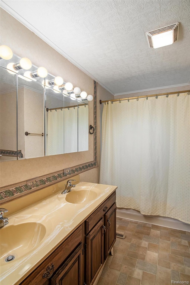 613 Genesee Ave, Gaines, MI 48436 - bathroom with double vanity, curtained shower, and stone finish flooring