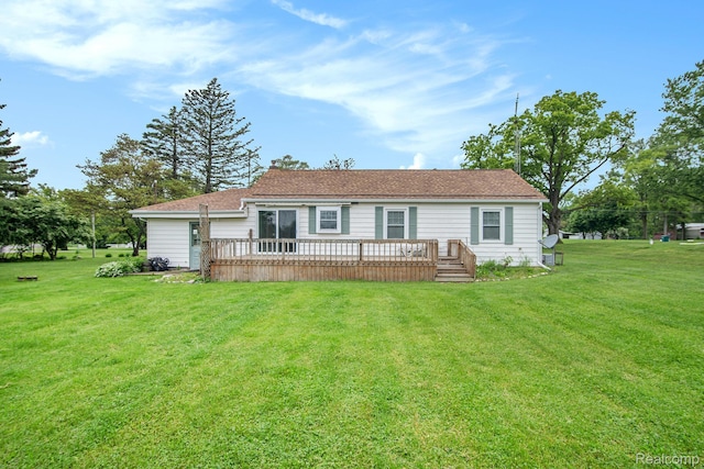 613 Genesee Ave, Gaines, MI 48436 - view of front of home featuring a deck and a front yard