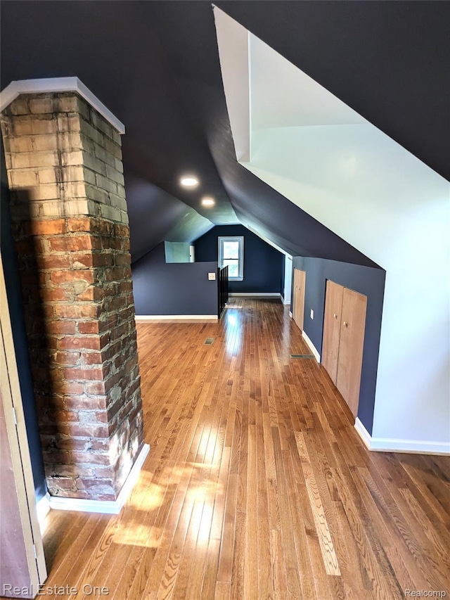 3255 Willet Ave, Rochester Hills, MI 48309 - bonus room featuring hardwood / wood-style floors, lofted ceiling, and baseboards