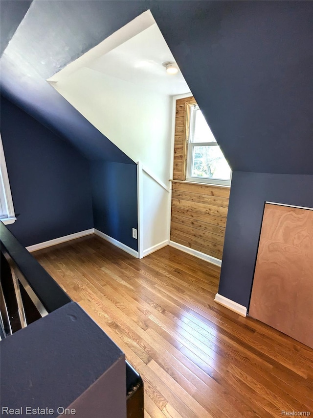 3255 Willet Ave, Rochester Hills, MI 48309 - bonus room featuring vaulted ceiling, wood finished floors, baseboards, and wooden walls