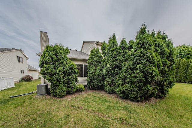 324 Redrock Ct, Ann Arbor, MI 48103 - view of grassy yard featuring central air condition unit