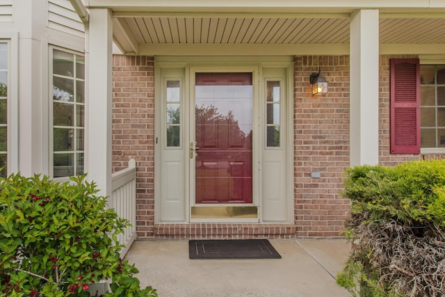 324 Redrock Ct, Ann Arbor, MI 48103 - property entrance with brick siding and a porch