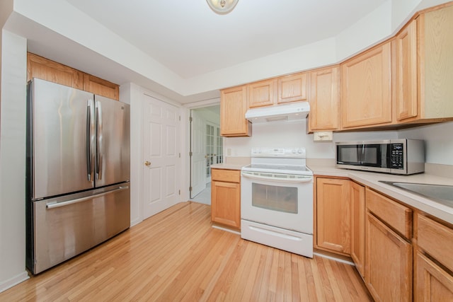 324 Redrock Ct, Ann Arbor, MI 48103 - kitchen featuring appliances with stainless steel finishes, under cabinet range hood, light wood-style flooring, and light countertops
