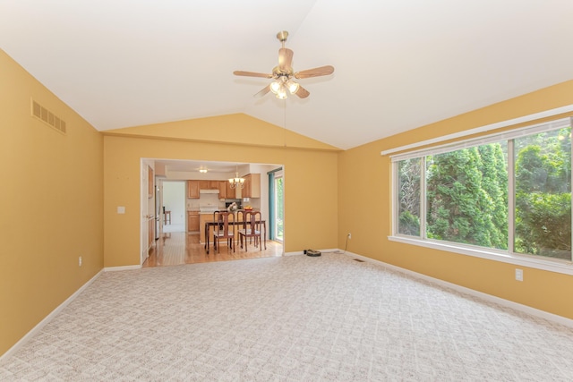 324 Redrock Ct, Ann Arbor, MI 48103 - spare room with light colored carpet, a ceiling fan, vaulted ceiling, and baseboards