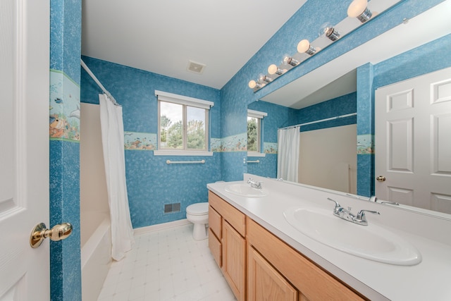 324 Redrock Ct, Ann Arbor, MI 48103 - full bath with double vanity, toilet, shower / bath combo, and wallpapered walls
