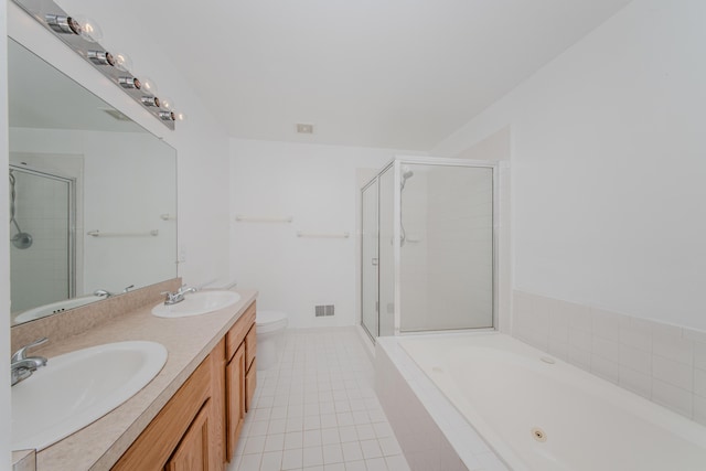 324 Redrock Ct, Ann Arbor, MI 48103 - full bath with a whirlpool tub, double vanity, toilet, a shower stall, and tile patterned floors