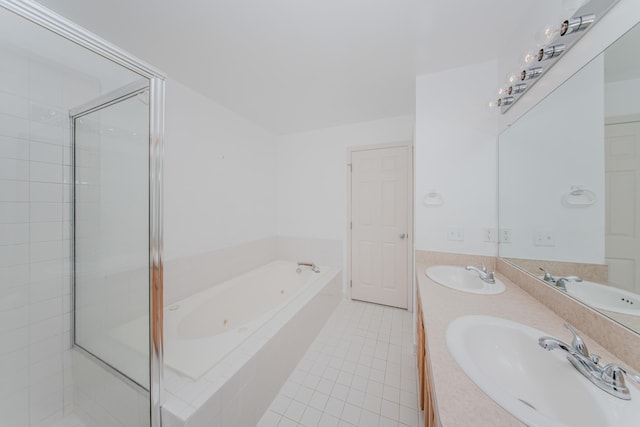 324 Redrock Ct, Ann Arbor, MI 48103 - full bathroom featuring a tub with jets, double vanity, a stall shower, and tile patterned flooring