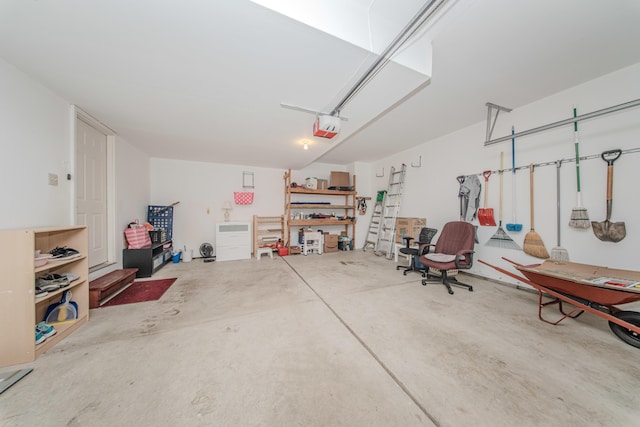 324 Redrock Ct, Ann Arbor, MI 48103 - garage featuring a garage door opener