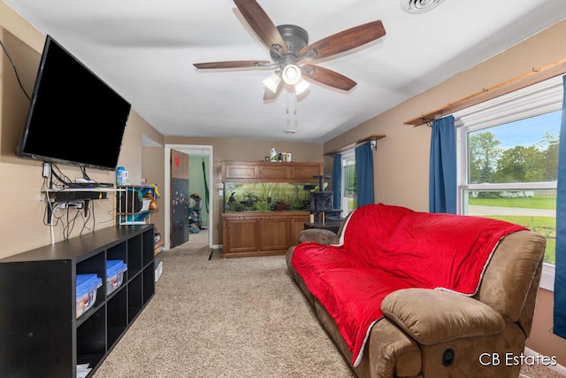 1044 Dahlia Ave, Wayland, MI 49348 - carpeted living room with a ceiling fan