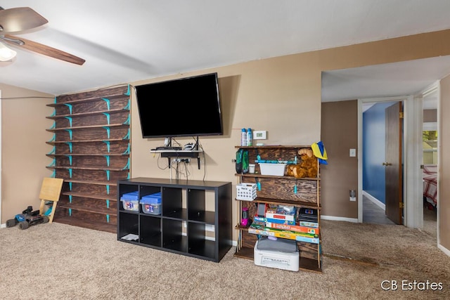 1044 Dahlia Ave, Wayland, MI 49348 - living room with carpet, ceiling fan, and baseboards