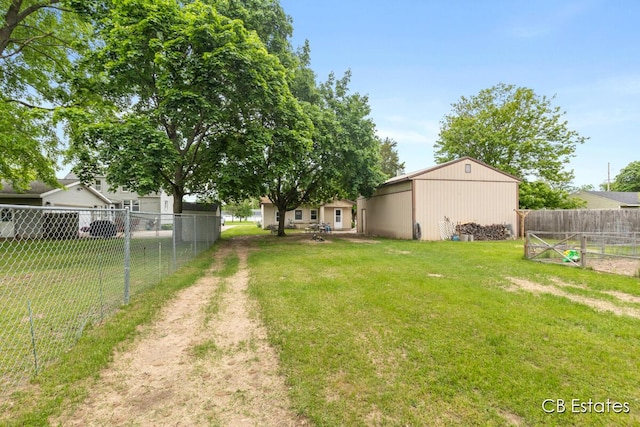 1044 Dahlia Ave, Wayland, MI 49348 - view of yard with an outbuilding