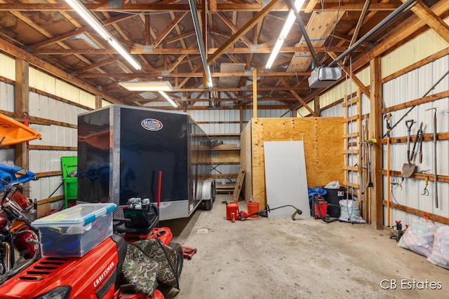 1044 Dahlia Ave, Wayland, MI 49348 - garage with a garage door opener