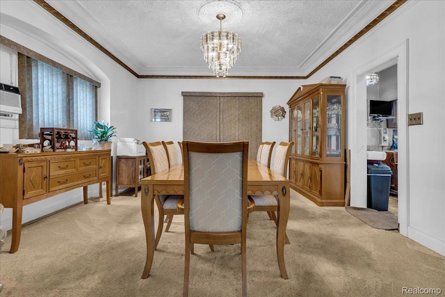 2505 Chicago Blvd, Detroit, MI 48206 - dining area with light colored carpet, a textured ceiling, a chandelier, and crown molding
