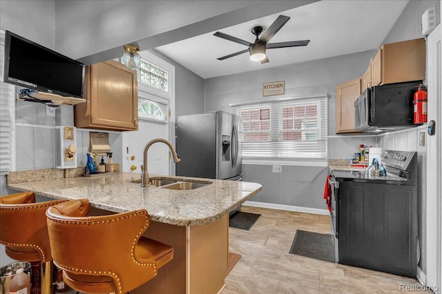 2505 Chicago Blvd, Detroit, MI 48206 - kitchen with electric range, a sink, stainless steel refrigerator with ice dispenser, a ceiling fan, and a peninsula