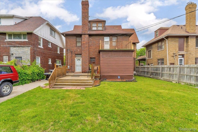 2505 Chicago Blvd, Detroit, MI 48206 - rear view of house featuring a balcony, a chimney, and brick siding