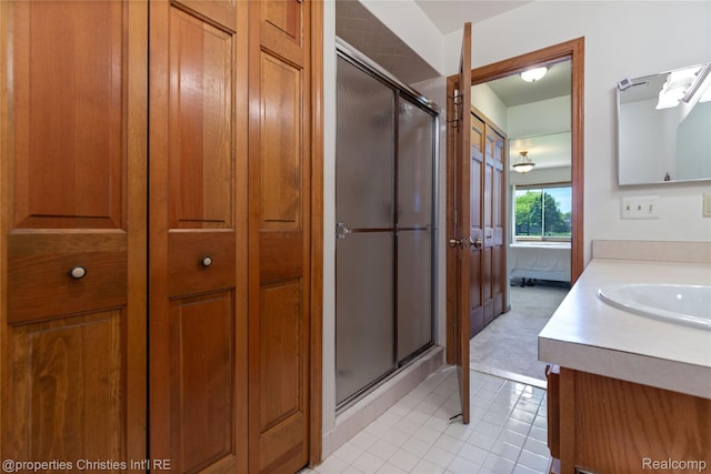 15380 Windmill Cir, Macomb, MI 48044 - ensuite bathroom with vanity, tile patterned floors, and a shower stall