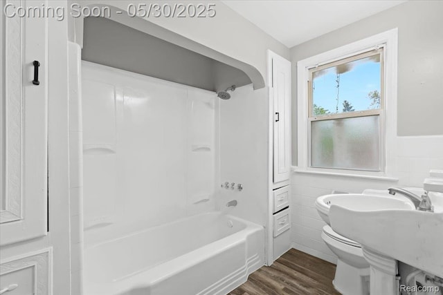 11000 Whitehill St, Grosse Pointe, MI 48224 - full bath featuring toilet, wood finished floors, shower / tub combination, wainscoting, and tile walls