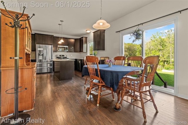 305 Beaver Run, Holly, MI 48442 - dining space featuring dark wood-style floors and plenty of natural light