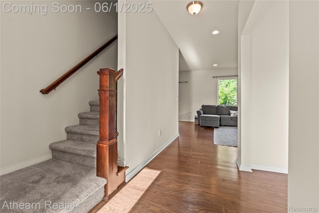 305 Beaver Run, Holly, MI 48442 - stairs with baseboards, wood finished floors, and recessed lighting