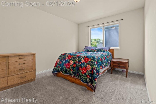 305 Beaver Run, Holly, MI 48442 - bedroom with carpet floors and baseboards