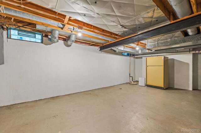 5138 Bayside Dr, Troy, MI 48098 - below grade area featuring freestanding refrigerator