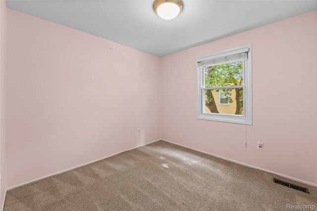 5138 Bayside Dr, Troy, MI 48098 - carpeted spare room with baseboards