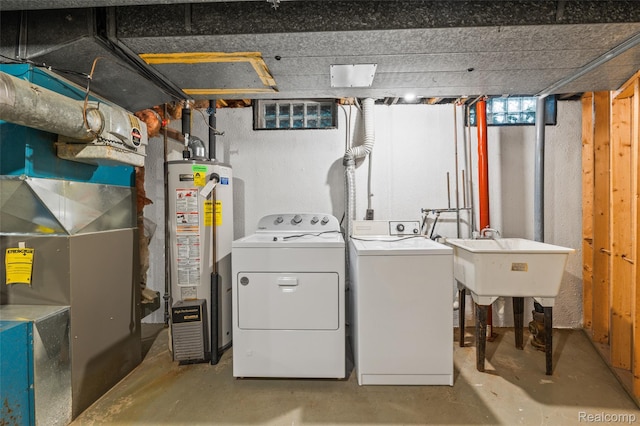 5138 Bayside Dr, Troy, MI 48098 - washroom featuring water heater, washing machine and clothes dryer, and heating unit