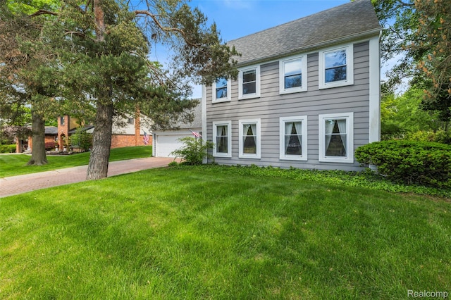 5138 Bayside Dr, Troy, MI 48098 - colonial house with roof with shingles, a front lawn, a garage, and concrete driveway