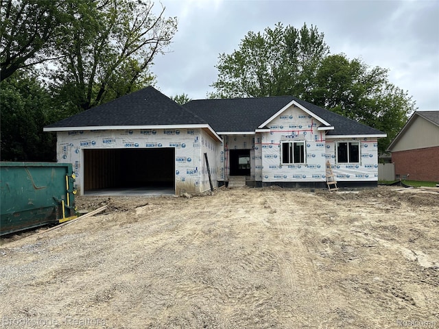 37116 Moravian Dr, Sterling Heights, MI 48036 - unfinished property with a garage, dirt driveway, and roof with shingles