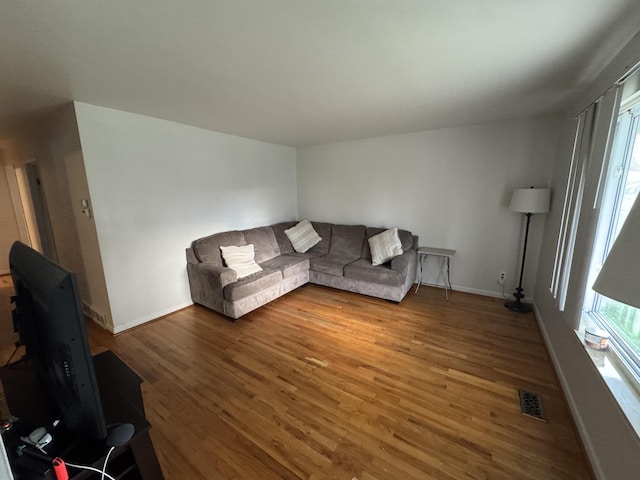 13497 Mark St, Southgate, MI 48195 - living area featuring wood finished floors and baseboards