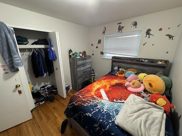 13497 Mark St, Southgate, MI 48195 - bedroom featuring wood finished floors and a closet