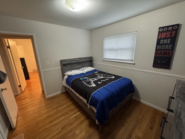13497 Mark St, Southgate, MI 48195 - bedroom with wood finished floors and baseboards