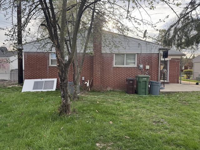 13497 Mark St, Southgate, MI 48195 - back of house with brick siding and a patio area