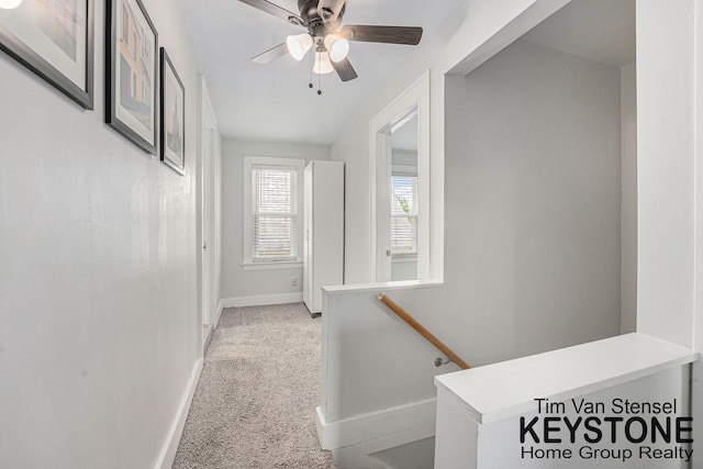 258 Ann St NE, Grand Rapids, MI 49505 - hall with light colored carpet and an upstairs landing