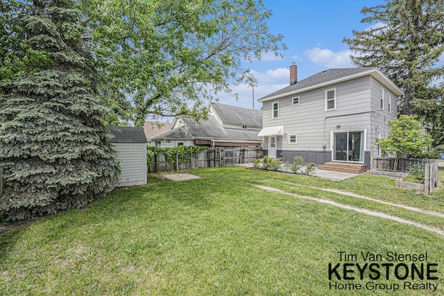 258 Ann St NE, Grand Rapids, MI 49505 - view of yard featuring a storage unit