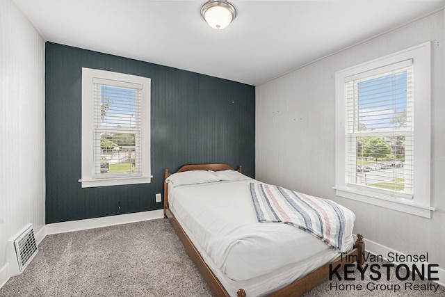 258 Ann St NE, Grand Rapids, MI 49505 - carpeted bedroom with multiple windows