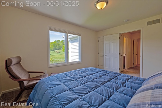 1572 S Hadley Rd, Ortonville, MI 48462 - carpeted bedroom featuring baseboards